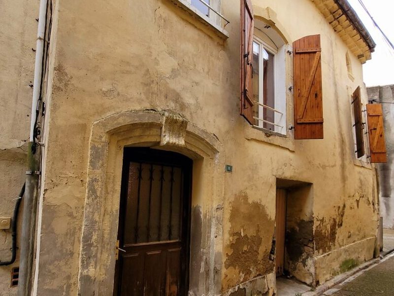 Village house with 45 m² living space, 30 m² garage, and 45 m² attic to convert.