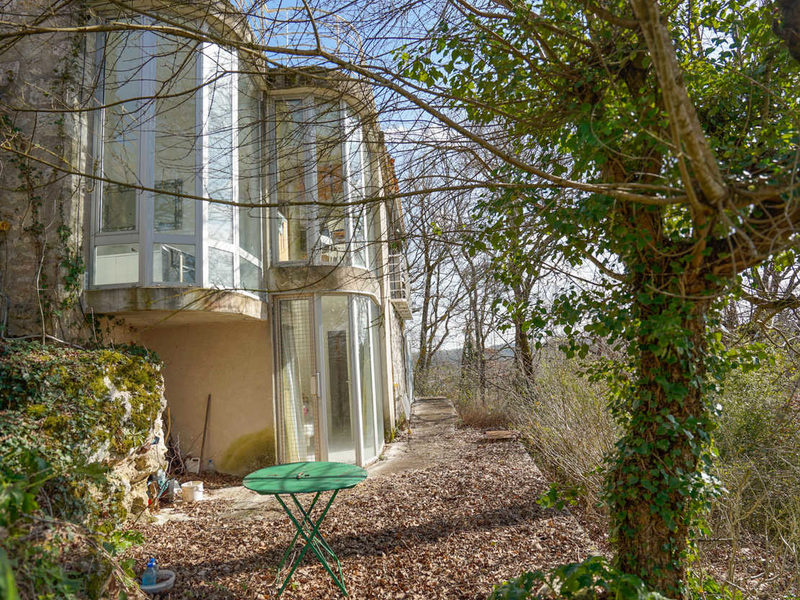 Atypisch architectenhuis aan de rand van het bos Zwembad,