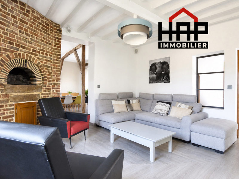 Maison type longère avec jardin, garage, places de stationnement