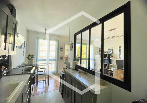 Appartement T2 avec balcon, cave et garage - Centre-ville de
