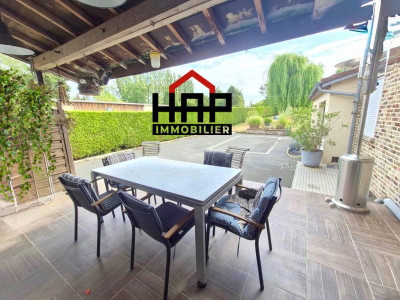 Maison type longère avec jardin, garage, places de stationne