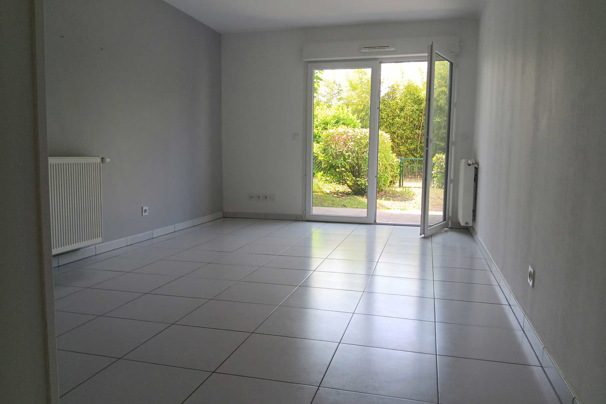 T2-appartement met tuin en parkeerplaats