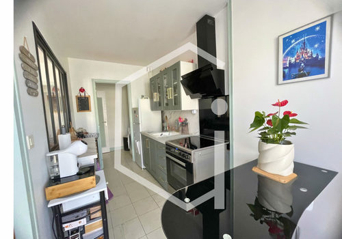 Appartement T2 avec balcon, cave et garage - Centre-ville de