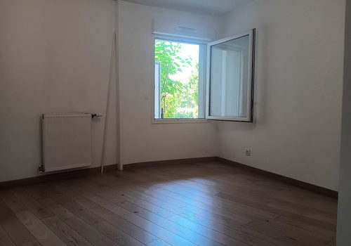 T2-appartement met tuin en parkeerplaats