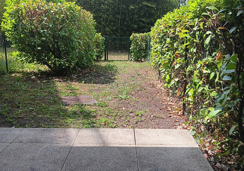 T2-appartement met tuin en parkeerplaats