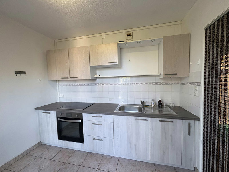 APPARTEMENT 3 PIÈCES AVEC PARKING, BALCON ET CAVE CASTELNAUD